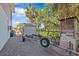 A wide gravel driveway allows for the parking of a boat and trailer, along with an adjacent storage shed at 6241 Colony Cir, Weeki Wachee, FL 34607