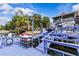 Dock featuring kayak storage, outdoor seating, direct water access, and 'Welcome River' signage at 6241 Colony Cir, Weeki Wachee, FL 34607