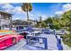 Dock featuring kayak storage, boat mooring, and comfortable seating, perfect for enjoying the waterfront at 6241 Colony Cir, Weeki Wachee, FL 34607