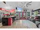Open-concept living space with modern kitchen, comfortable seating, and cozy decor at 6241 Colony Cir, Weeki Wachee, FL 34607