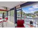 Relax in style on this charming covered porch, with comfortable seating and picturesque views of the waterfront at 6241 Colony Cir, Weeki Wachee, FL 34607
