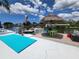 Charming waterfront dock with a shaded tiki hut, perfect for enjoying peaceful moments by the canal at 6737 Clark St, Hudson, FL 34667