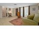 Cozy living room with tile flooring and a neutral color scheme at 6930 El Camino Paloma St, Port Richey, FL 34668