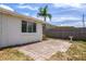This home has a charming brick patio, perfect for entertaining or relaxing in the serene backyard at 6930 El Camino Paloma St, Port Richey, FL 34668
