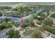Gorgeous waterfront property with private dock and lush landscaping, a true Florida oasis at 6936 River Rd, New Port Richey, FL 34652