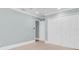 Large bedroom with a triple closet providing ample storage, complemented by modern, neutral paint at 6936 River Rd, New Port Richey, FL 34652