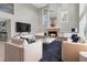Bright living room with a fireplace, soaring ceilings, and stylish furnishings, perfect for entertaining at 6936 River Rd, New Port Richey, FL 34652