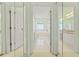 Bathroom with double doors and soaking tub at 7328 Blue Skies Dr, Spring Hill, FL 34606