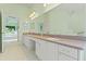 Bathroom featuring double sinks with vanity at 7328 Blue Skies Dr, Spring Hill, FL 34606