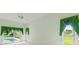 Light and airy bedroom featuring exterior view of pool area at 7328 Blue Skies Dr, Spring Hill, FL 34606