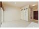 Kitchen nook featuring pantry cabinets and sliding glass doors at 7328 Blue Skies Dr, Spring Hill, FL 34606