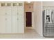 Bright kitchen with stainless steel refrigerator and pantry storage at 7328 Blue Skies Dr, Spring Hill, FL 34606