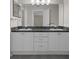 Bathroom featuring a double sink vanity at 7445 Nature Walk Dr, Spring Hill, FL 34606