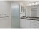 Bathroom with a glass shower and white vanity at 7445 Nature Walk Dr, Spring Hill, FL 34606