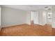 This spacious bedroom has bright windows and an ensuite bathroom at 7445 Nature Walk Dr, Spring Hill, FL 34606