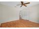 Bedroom featuring laminate floors and white walls at 7445 Nature Walk Dr, Spring Hill, FL 34606