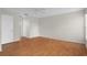 Spacious bedroom with wood flooring and a ceiling fan at 7445 Nature Walk Dr, Spring Hill, FL 34606