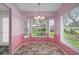 Charming breakfast nook featuring bay windows, and natural light, perfect for morning coffee or casual dining at 7445 Nature Walk Dr, Spring Hill, FL 34606