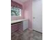 Home office space features a built-in desk and a window at 7445 Nature Walk Dr, Spring Hill, FL 34606