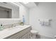 Bathroom featuring a vanity with a marble countertop and tiled floors at 7715 Radcliffe Cir, Port Richey, FL 34668