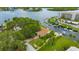 Stunning waterfront property with lush landscaping, private dock, and easy access to the open water at 8143 Channel Dr, Port Richey, FL 34668