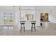 Bright, open kitchen with bar seating and views of the water at 8143 Channel Dr, Port Richey, FL 34668