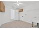 Functional laundry room with storage cabinets, tile flooring, and utility sink at 8143 Channel Dr, Port Richey, FL 34668