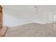 Open living area with sleek floors and lots of natural light at 8143 Channel Dr, Port Richey, FL 34668