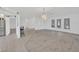 Open floor plan with a view of the kitchen, living and dining areas at 8143 Channel Dr, Port Richey, FL 34668