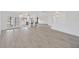 Open-concept floor plan and bright interior with views to the kitchen at 8143 Channel Dr, Port Richey, FL 34668