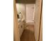 Bright bathroom with a white vanity, modern fixtures, and a tub-shower combo with white tile at 8209 Golf Club Ct, Hudson, FL 34667