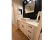 Modern bathroom features a sleek vanity, vessel sink, and contemporary fixtures at 8209 Golf Club Ct, Hudson, FL 34667