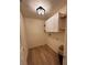 Functional laundry room features ample storage with a clean aesthetic at 8209 Golf Club Ct, Hudson, FL 34667