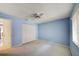Bedroom with a window and closet with bi-fold doors at 8540 Caitlin Ct, Hudson, FL 34667