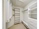 A walk-in closet featuring white shelving at 8540 Caitlin Ct, Hudson, FL 34667