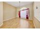 Spacious dining room featuring wood floors, and an elegant chandelier at 8540 Caitlin Ct, Hudson, FL 34667