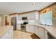 Updated kitchen with stainless steel appliances and plenty of counter space at 8540 Caitlin Ct, Hudson, FL 34667