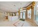 Bright kitchen area features an open layout, double doors, and a large island with bar seating at 8540 Caitlin Ct, Hudson, FL 34667