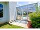 A refreshing pool is visible through the screened enclosure at 8540 Caitlin Ct, Hudson, FL 34667