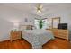 Stylish bedroom features coordinated decor and natural lighting at 8811 Napa Loop, New Port Richey, FL 34653