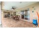 Charming lanai with stone flooring and views of the pool at 8811 Napa Loop, New Port Richey, FL 34653