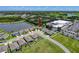 This aerial view shows the home's location within the community and its proximity to nearby amenities at 8855 Prairie Creek Dr, New Port Richey, FL 34655