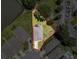 Aerial view of a single Gathering home with a red line showing the property boundaries at 8855 Prairie Creek Dr, New Port Richey, FL 34655