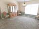 Inviting dining area with natural light and classic china cabinet providing ample space for storage at 9168 Southern Comfort Ct, Weeki Wachee, FL 34613