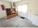 Garage space featuring storage solutions and access to the exterior through double doors at 9168 Southern Comfort Ct, Weeki Wachee, FL 34613