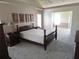 Spacious main bedroom featuring neutral colors and a large window for natural light at 9168 Southern Comfort Ct, Weeki Wachee, FL 34613