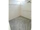 Walk-in closet with multiple shelves for storage and organization at 9168 Southern Comfort Ct, Weeki Wachee, FL 34613