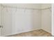 Walk-in closet featuring wire shelving at 9420 Georgian Park Ln # 106, Tampa, FL 33626