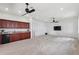 Expansive bonus room includes a wet bar, recessed lighting, and a ceiling fan to keep you cool at 9829 Sorbonne Loop, Seffner, FL 33584