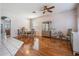 Inviting dining space with wood floors, chandelier, and elegant furnishings at 10435 Peppergrass Ct, Trinity, FL 34655